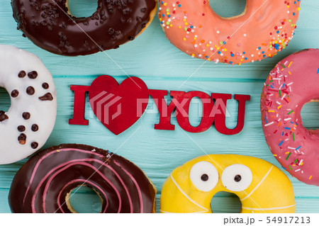 Romantic composition with assorted donuts. Romantic composition with assorted donuts. 54917213