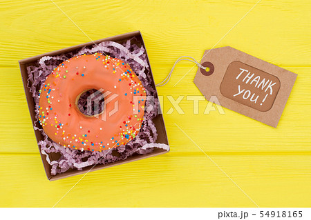 Iced doughnut with price tag. Iced doughnut with price tag. 54918165