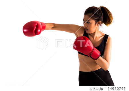 Portrait of a young female boxer punching on white isolated background with copy space 54920745