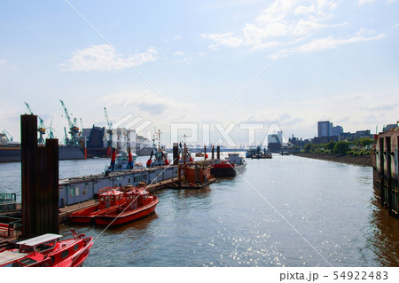 boats are parked near the port 54922483