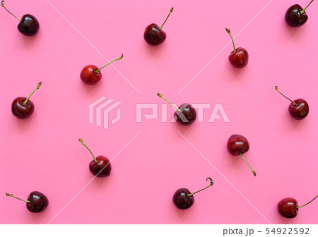 Big sweet cherry on a bright background 54922592