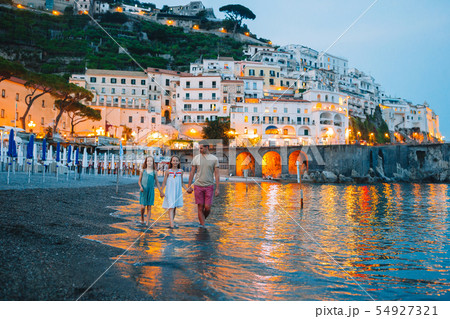 Adorable little girl on sunset in Amalfi town in Italy Adorable little girl on sunset in Amalfi town in Italy 54927321