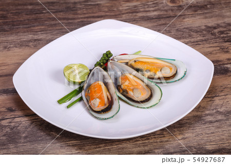Half mussels with lime and pepper Half mussels with lime and pepper 54927687