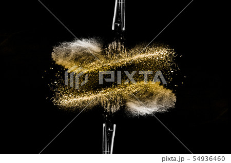 golden powder black background golden powder black background 54936460