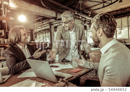 Emotional businessman presenting his future project work 54940652