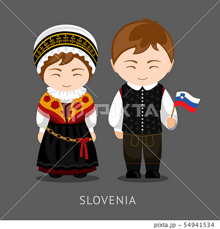 Slovenes in national dress with a flag. 54941534