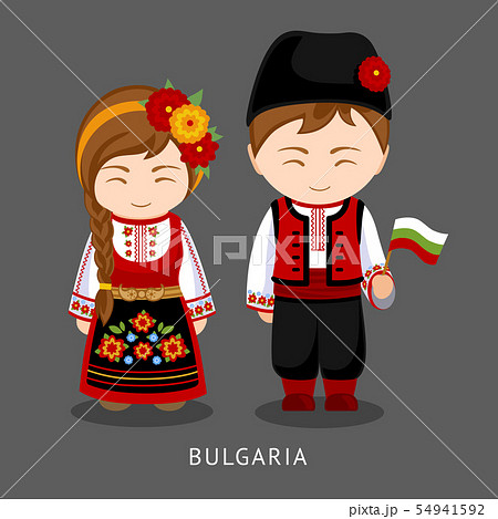 Bulgarians in national dress with a flag. 54941592