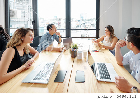 People working with laptops at office 54943111