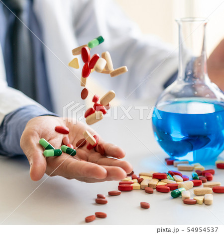 Medicine pills and tablets in research lab. 54954537