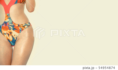 Woman in swimsuit posing on color background. Woman in swimsuit posing on color background. 54954874