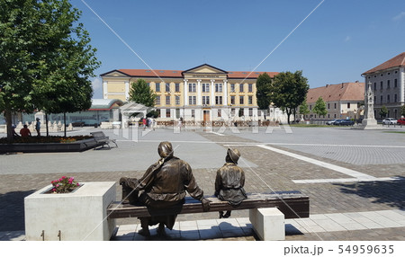 Sculpture and university building 54959635