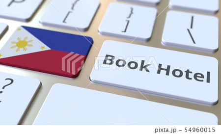 BOOK HOTEL text and flag of Philippines on the buttons on the computer keyboard. Travel related BOOK HOTEL text and flag of Philippines on the buttons on the computer keyboard. Travel related 54960015