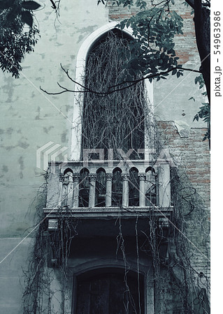 Abandoned city building with balconies and windows, in which there is no one else, close up Abandoned city building with balconies and windows, in which there is no one else, close up 54963986