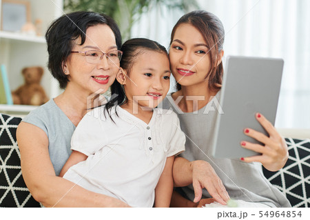 Selfie portrait on digital tablet Selfie portrait on digital tablet 54964854