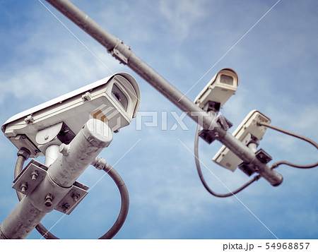 3 CCTV security cameras on a high pole 3 CCTV security cameras on a high pole 54968857