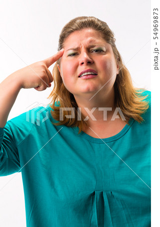 Fatty woman having headache 54969873