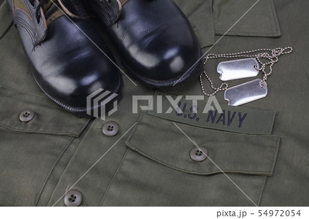 U.S. Navy Branch Tape with dog tags on olive green 54972054