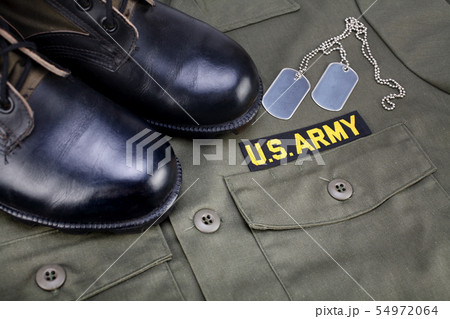 U.S. Army Branch Tape with dog tags and boots on 54972064