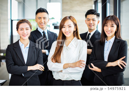 confident asian business team stands in office confident asian business team stands in office 54975921