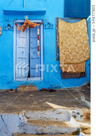Old wood carved door in Blue City of Jodhpur. Old wood carved door in Blue City of Jodhpur. 54977905