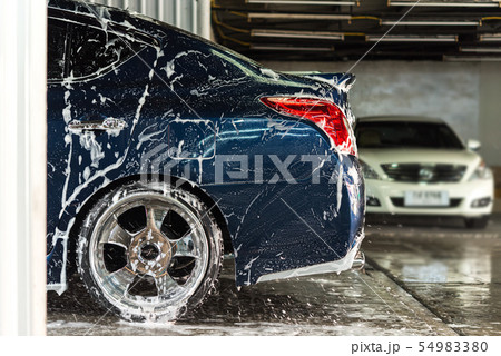 Cleaning the car (Car detailing) at car care shop 54983380