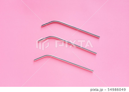 Flat lay of metallic stainless straws for drink on Flat lay of metallic stainless straws for drink on 54986049