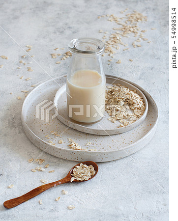 Vegan oat milk, non dairy alternative milk Vegan oat milk, non dairy alternative milk 54998514