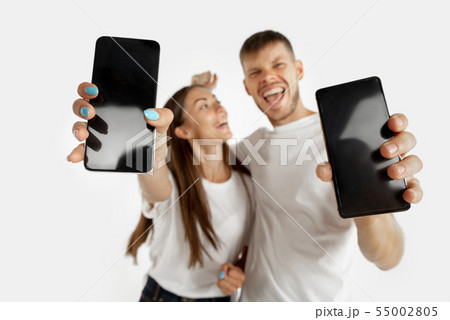 Portrait of beautiful couple isolated on white studio background 55002805