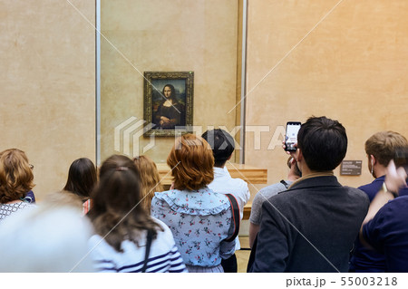 Visitors take photo of Leonardo DaVinci's Mona Lisa at the Louvre Museum 55003218