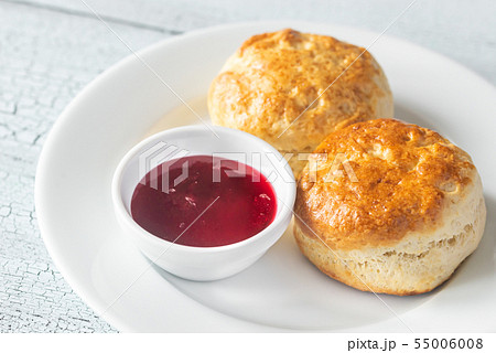 Classic scones with cream and berry jam Classic scones with cream and berry jam 55006008