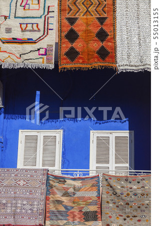 Rugs hanging from balconies in Marrakesh, Morocco 55013155