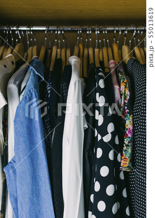 Clothes in wardrobe 55013619