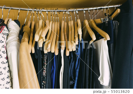 Clothes in wardrobe 55013620