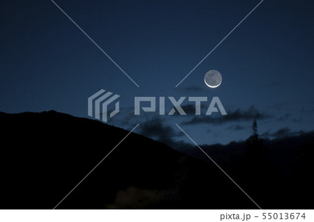 Full moon above mountains 55013674