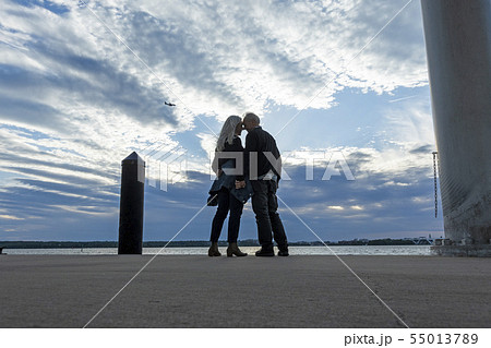 Couple by Potomac River in Washington DC, USA 55013789