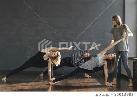 Women during yoga class Women during yoga class 55013983