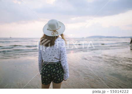 Young woman in sun hat on beach in Krabi, Thailand 55014222