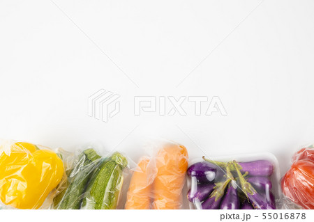 Fresh and plastic wrapped vegetable. 55016878