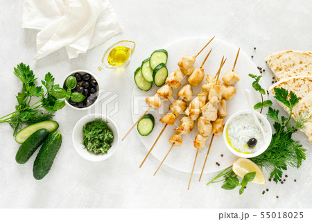 Grilled chicken kebab on skewers and traditional Grilled chicken kebab on skewers and traditional 55018025