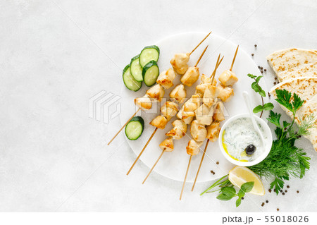 Grilled chicken kebab on skewers and traditional 55018026