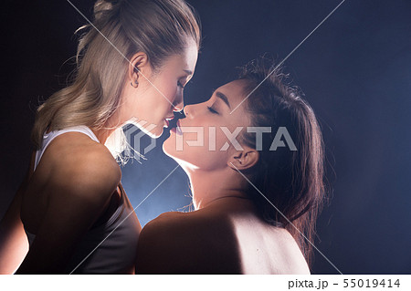 Two beautiful Asian sexy lesbian women hair touch Two beautiful Asian sexy lesbian women hair touch 55019414