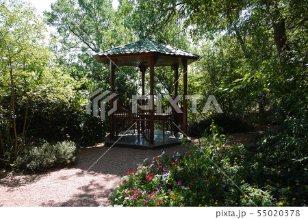 A tiny gazebo in the garden. You can sit and enjoy 55020378