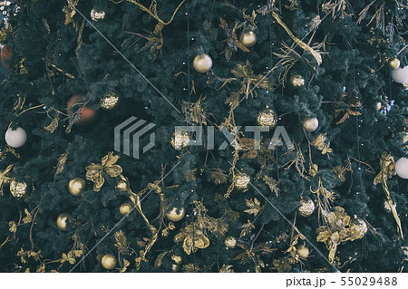 Christmas fir tree with golden decorations, balls, background, texture Christmas fir tree with golden decorations, balls, background, texture 55029488
