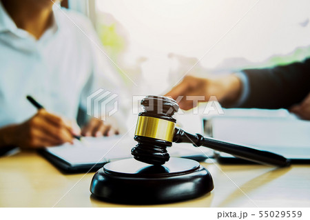 Judge gavel with Justice lawyer having team 55029559