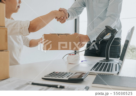 Business confident handshake and business people Business confident handshake and business people 55030525