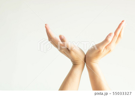 Palm of hands unfold in right and left direction. 55033327