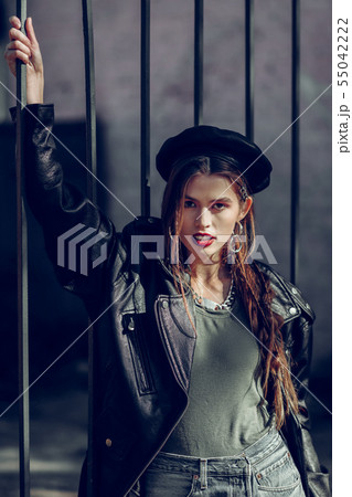Expressive good-looking woman in stylish unusual outfit Expressive good-looking woman in stylish unusual outfit 55042222