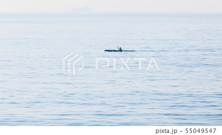 Surf Ski Canoe Paddler Ocean Silhouetted Landscape Surf Ski Canoe Paddler Ocean Silhouetted Landscape 55049547
