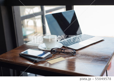 Working desk with laptop in the morning. 55049578