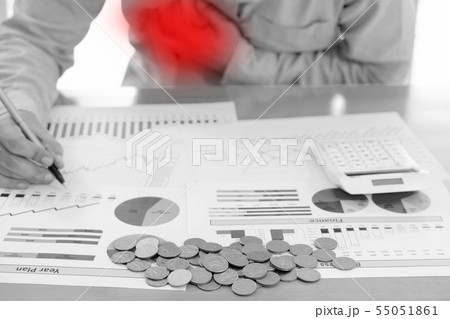 Businessman clutching his chest from acute pain. Businessman clutching his chest from acute pain. 55051861